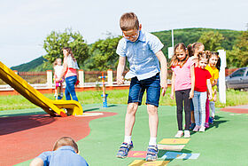 Entertaining physical education lesson in the summer outdoors
