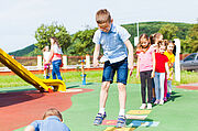 Entertaining physical education lesson in the summer outdoors